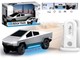 Futuristinis nuotoliniu būdu valdomas automobilis su įkrovimo stotele