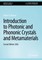 Introduction to Photonic and Phononic Crystals and Metamaterials