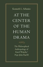 At the Center of the Human Drama