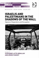 Israelis and Palestinians in the Shadows of the Wall